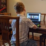 Young boy having online tutoring with Bettering Youth