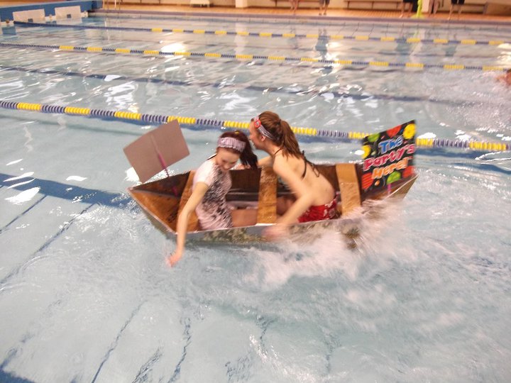 Sarahlynn participating in a boat race